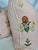 Custom pair of 22" pillows covered in Schumacher "Elmslie Embroidery" in color petal and backed in a coodinating linen....