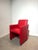 A vibrant set of red skai leather armchairs, crafted in the 1980s with a clean, modern silhouette and smooth lines. Each...
