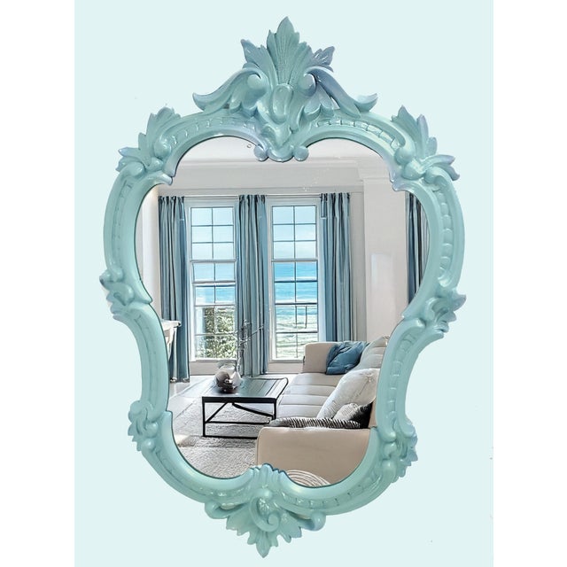 Offering a beautiful Mid 20th Century restored Italian wall mirror, signed "Italy" on verso. This Venetian style wall...