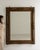 This mirror makes its impression through dark bronze ornate carved frame, rectangular. The piece dates to 19th Century,...