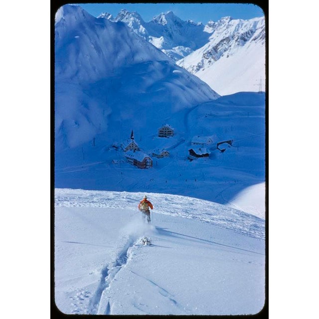 Snow Plough 1955 A lone skier heads down into the valley at the St. Anton ski resort, Austria, 1955. Toni Frissell...