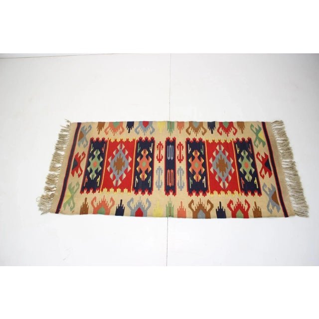 In good condition. Double-sided carpet. Kelim carpet, carpet. Made of wool. Visible signs of use at the edges of the...