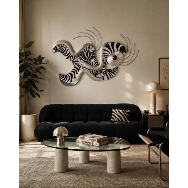 Striking large-scale 1980s wall sculpture by Shlomi Haziza, featuring a dynamic abstract composition of layered black-and-...