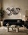 Striking large-scale 1980s wall sculpture by Shlomi Haziza, featuring a dynamic abstract composition of layered black-and-...