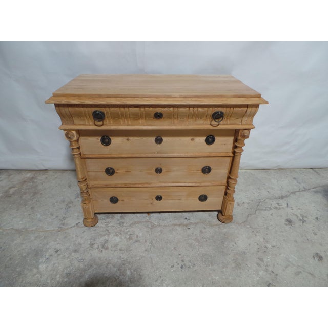This is a Rare and unusual Natural finish 4 drawer chest of drawers. it was stripped of the Glossy white New paint and...