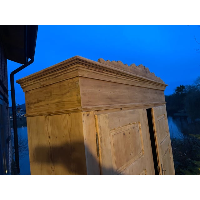 This charming antique wardrobe, designed for disassembly, has been completely sanded inside and out. We haven't oiled it...