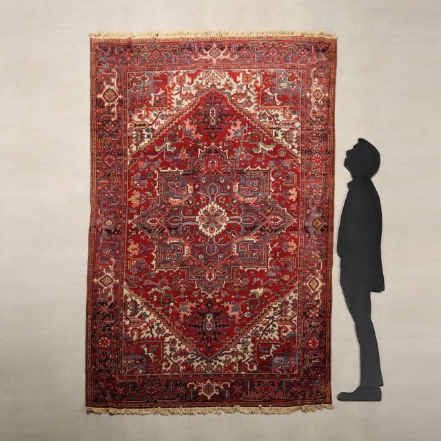 Heriz rug in cotton and wool, large knot, hand-made. Good condition. This piece is attributed to the mentioned...