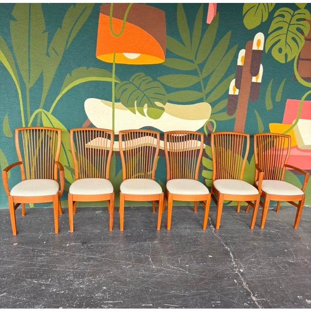 An exceptional teak dining set in near immaculate condition! The table is manufactured by Nordic Furniture, a Canadian...