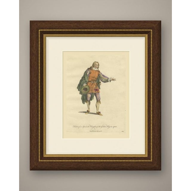 An original antique print, a copper engraving colored by hand, lettered "habit of a spanish knight of the golden key in...