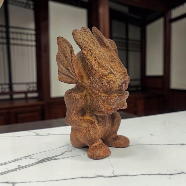 A substantial contemporary lapidary carving masterfully sculpted in the archaic style of the Neolithic Hongshan culture....