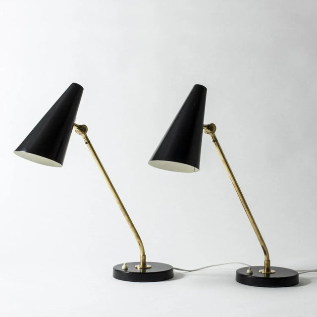 Pair of amazing table or desk lamps by Bertil Brisborg, large in size, with elongated, strikingly angled stems. Made from...
