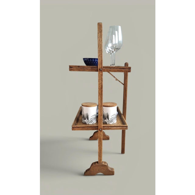 Originally a dumbwaiter from the late 19th century, this piece embodies a functional elegance that is highly sought after...