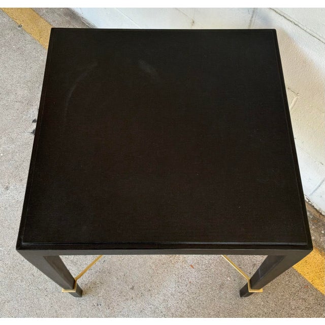 Original retail $1240, stylish Currey & Co. Modern Black Verona End Table, brass streamline, showroom floor sample