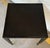 Original retail $1240, stylish Currey & Co. Modern Black Verona End Table, brass streamline, showroom floor sample
