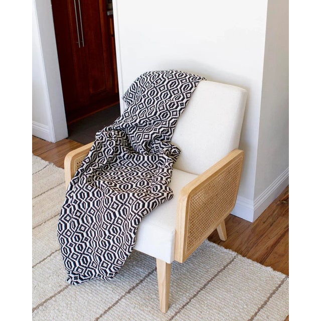 This hand made artisanal throw is made by hand in Southern Portugal. The striking gray geometric pattern is the perfect...
