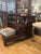 This is a late 1940s step chest or commode or library stairs executed in richly toned mahogany with dramatic Ming-style...