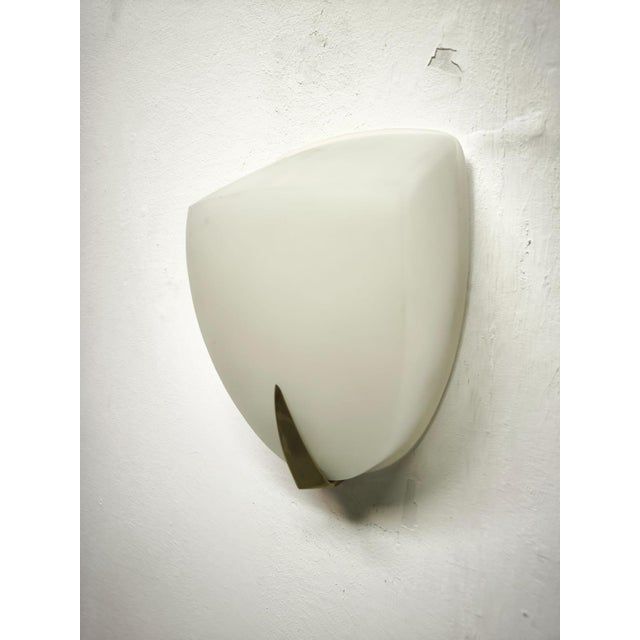 Rationalist Wall Light in White Glass, 1940s, in Very Good conditions. Designed 1920 to 1949 Up to 250V (Europe/UK...