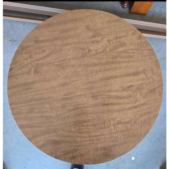 Add classic Mid-Century Modern charm to your space with this **Vintage MCM round end table**, featuring a warm **maple...
