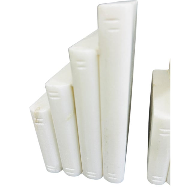 A striking pair of vintage bookends, hand-carved from solid white marble or alabaster stone. These functional art pieces...
