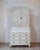 A distinguished Swedish writing cupboard crafted in solid pine, dating to approximately 1800. The two-part form combines...