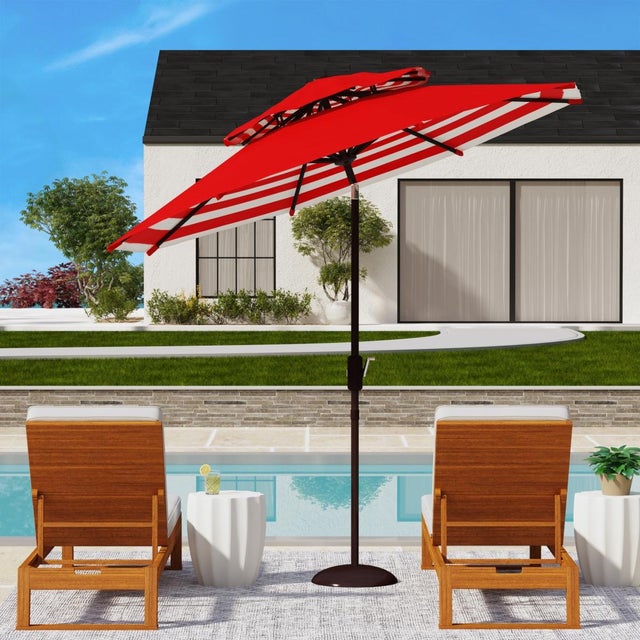 This nine foot crank umbrella was inspired by the sunbathing terrace of Monacos Mediterranean overlook hotels. Embracing...