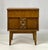 Vintage "Zenith" collection nightstand by Bassett Furniture. Crafted in a rich, warm walnut finish, this piece features...