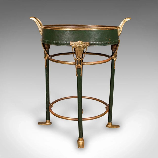 This is an antique bottle cooler, a French, painted brass cocktail party or jardinière stand, dating to the Victorian...