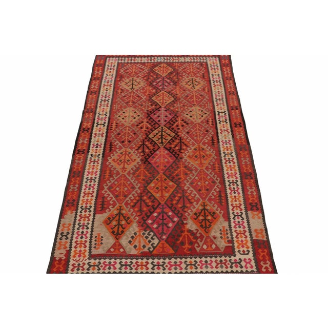 This vintage 5x10 Kilim is a new addition to Rug & Kilim’s rare tribal curations. Handwoven in wool, it originates from...