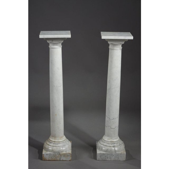 Pair of columns in white marble with natural gray veins, ideal for setting white marble sculptures. French work from the...