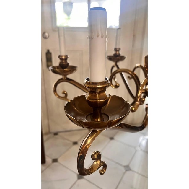 Beautiful solid brass chandelier from a Massachusetts mansion estate sale. Retailed for $3500. There is no maker's mark....