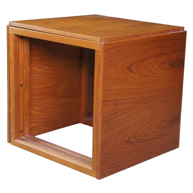 Mid Century Modern Danish cube tables by Kai Kristiansen for Vildberg Mobelfabrik. Made of teak featuring square form with...