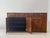 Elegant vintage sideboard with a high-quality veneer in a striking Makassar wood look. The clean lines and the richly...