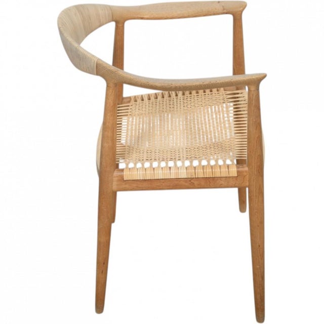 Hans Wegner The Chair JH501 with a frame of oak and back and seat of wicker. The chair is from the 1960s but was later...