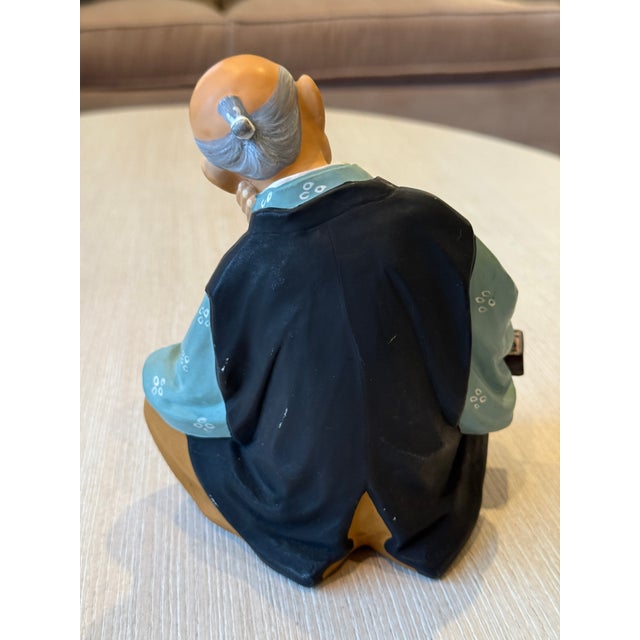 Vintage mid-century Japanese export figurine, dating to the 1950s–early 1960s, marked “Made in Japan” on the base. The...