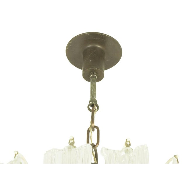 This rare chandelier was produced in Italy by the famous glassworks Venini around the 1960s. It is made from 51 hand-made...