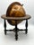 Vintage Italian desk globe featuring antique-style cartography, sailing ships, compass roses, and hand-colored detailing....