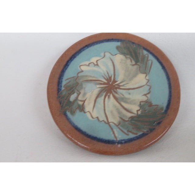 This gorgeous lidded Trinket Box / Jar is made of clay pottery. The jar features a beautiful blue floral motif which was...