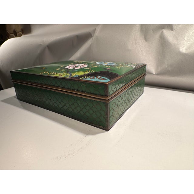 This listing is for an antique Japanese vanity box. The box features a very high quality cloisonné enamel exterior with...