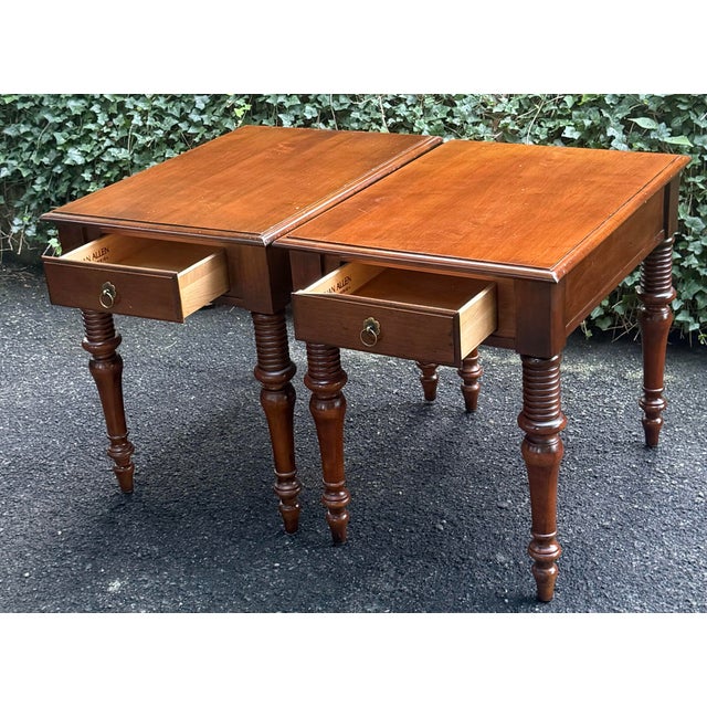 Beautiful pair of Ethan Allen end tables from the popular “British classics” collection. Features robust ring-turned,...