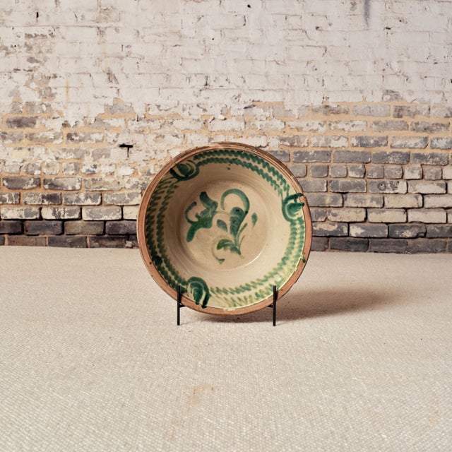 Infuse your space with authentic Mediterranean charm with this 20th century Spanish pottery bowl with stand, a beautifully...