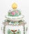 Pair of Floral Painted Porcelain Covered Urns, marked "Japanese Porcelain Ware / Decorated in Hong Kong" to underside....