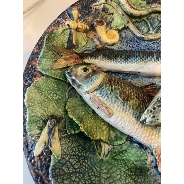 A fine and intricately detailed 19th-century French Palissy ware majolica plate, executed in the naturalistic style of the...