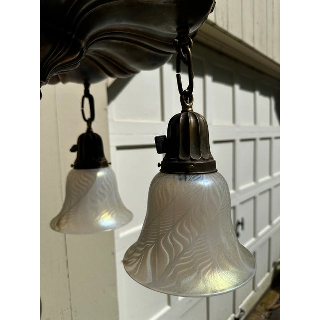 Old Lights On is pleased to offer this vintage brass Sheffield fixture with art glass shades by Lundberg Studios. It is...