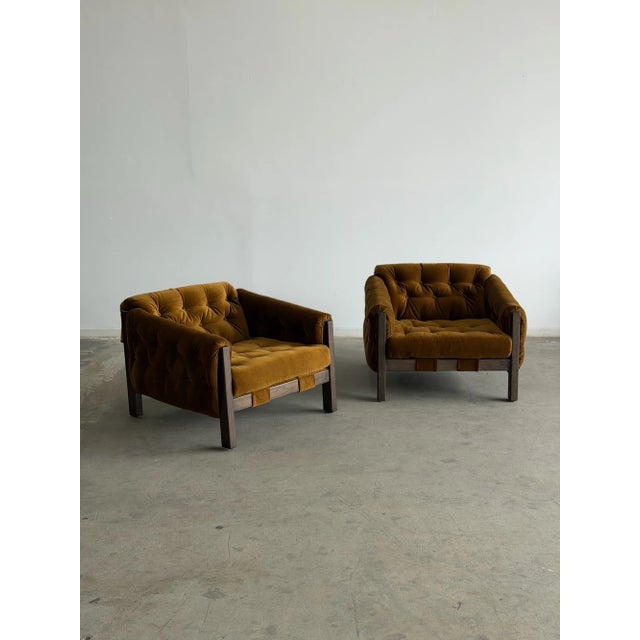 W35 D37 H27 SW27 SD24 SH17 AH23.5 These custom made lounge chairs, made from solid wood with a dark walnut stain help...