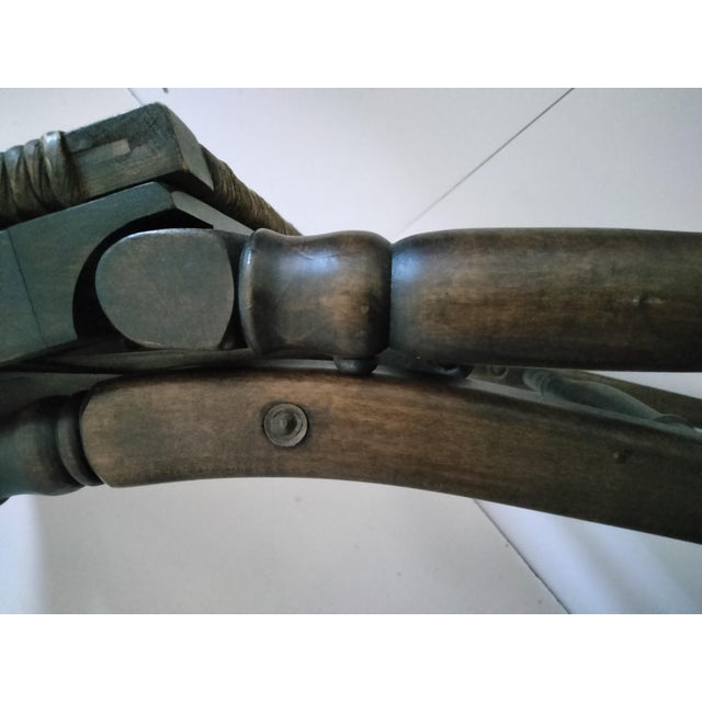 Beautiful set of four vintage Stackmore folding ladder-back solid wood frame chairs. Original hand-woven rush seats that...