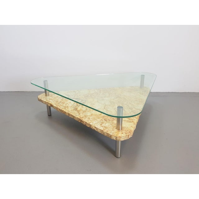 Brutalist triangle coffee table marble stainless steel glass eclectic ’70s The base is made of three stainless steel metal...