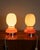 Pair of table lamps with chromed metal base and white and orange glass body, Italian design, 1970s. European Plug (up to...