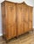 This elegant Vintage French Louis wardrobe is a superb example of classic French craftsmanship, featuring a warm oak...