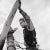 James Dean As Jett Rink in "Giant" James Dean posed leaning with his hand on a fence post while filming a scene for...