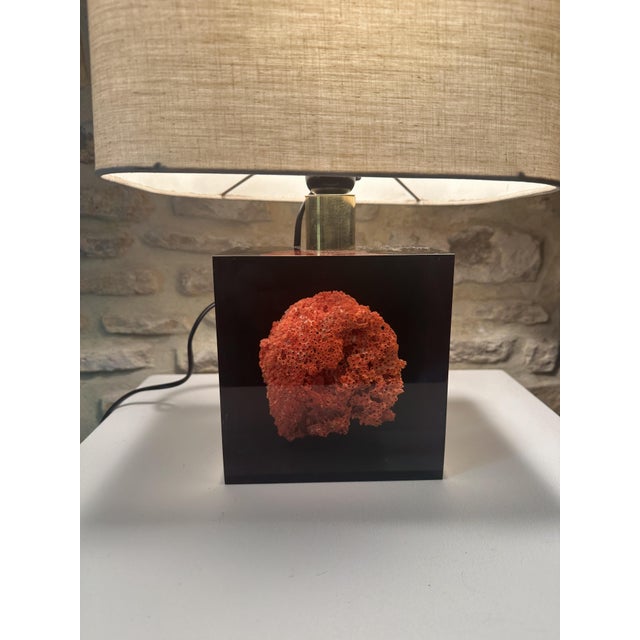 Table lamp by pierre giraudon, model "coral", inclusion of a coral in a block of resin, the lampshade is original, a piece...